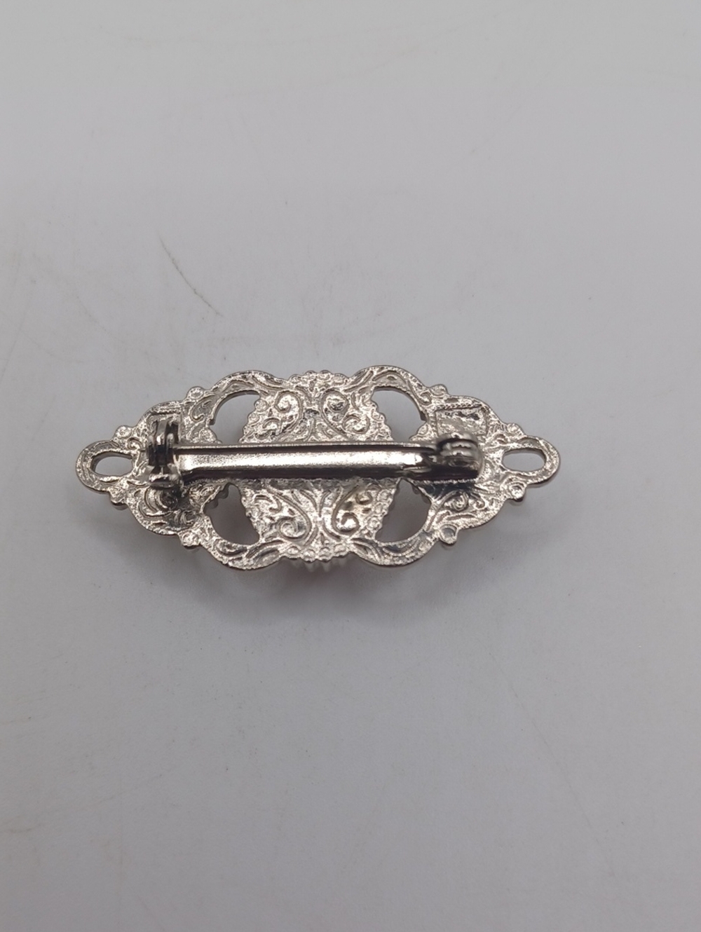 1928 Silver Tone Scroll Brooch With Pink and White Accents - Picture 3 of 5